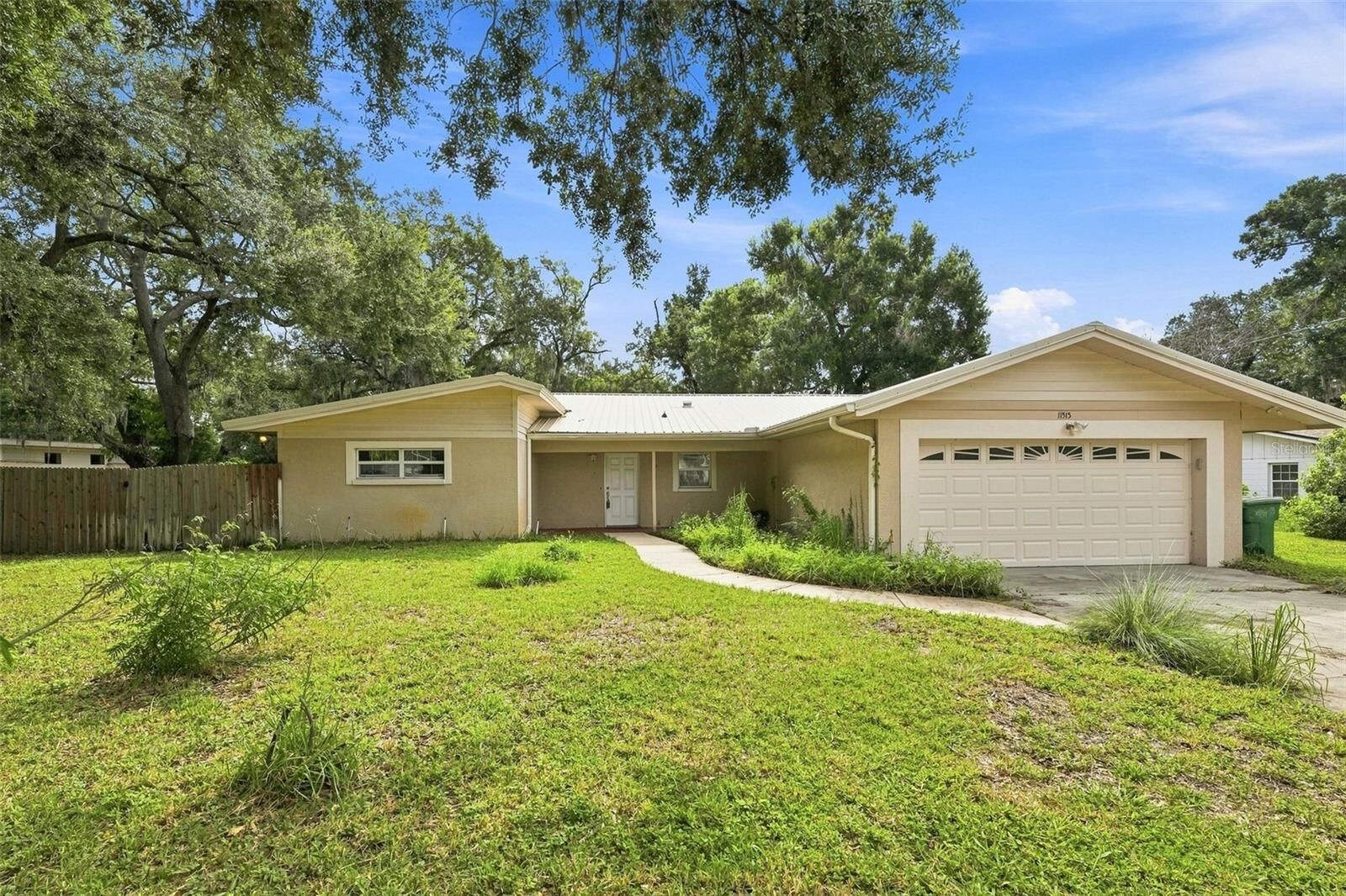Property Photo:  11515 N Ravine Road  FL 33612 