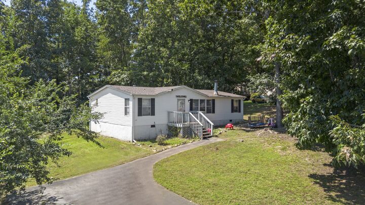 Property Photo:  210 W Meadows Ln NE  TN 37312 