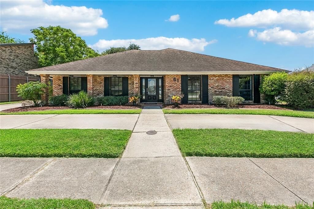 Property Photo:  61 Woodlake Boulevard  LA 70065 