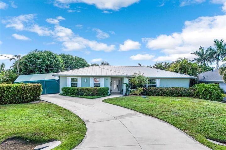 Property Photo:  401 Panay Ave  FL 34113 