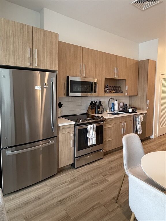 Property Photo:  301 Guest St 304  MA 02134 