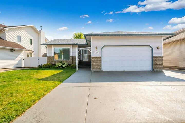 Property Photo: 159 Shannon Drive SE AB T1B 4C2