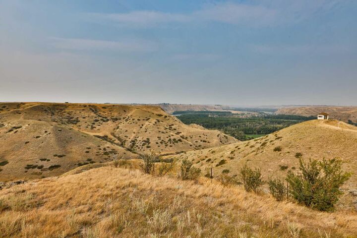 Property Photo:  221012 Twp Rd 9-2  AB T1J 5R1 