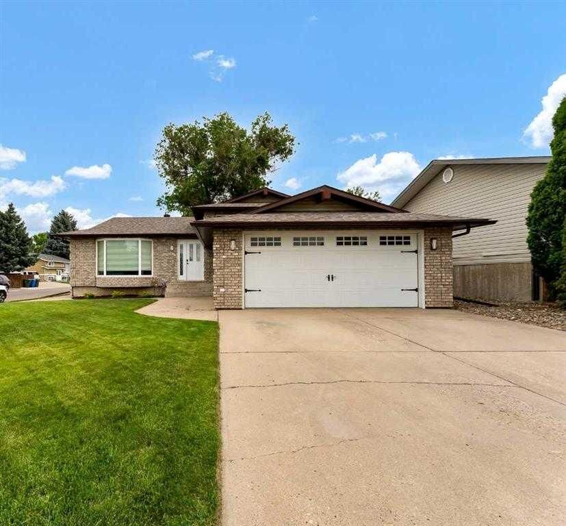 Property Photo:  238 Cameron Road SE  AB T1B 1P3 