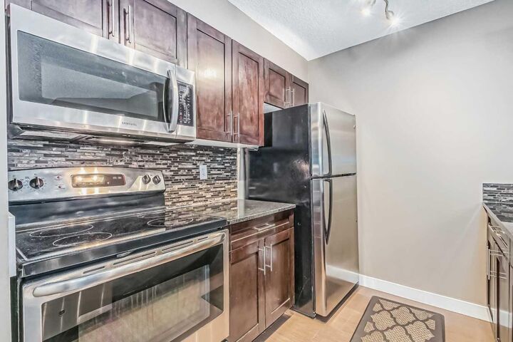 195 Kincora Glen Road NW 305 — photo 1