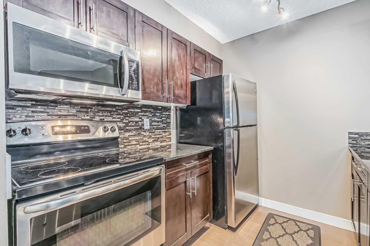Property Photo: 195 Kincora Glen Road NW 305 AB T3R 0S3