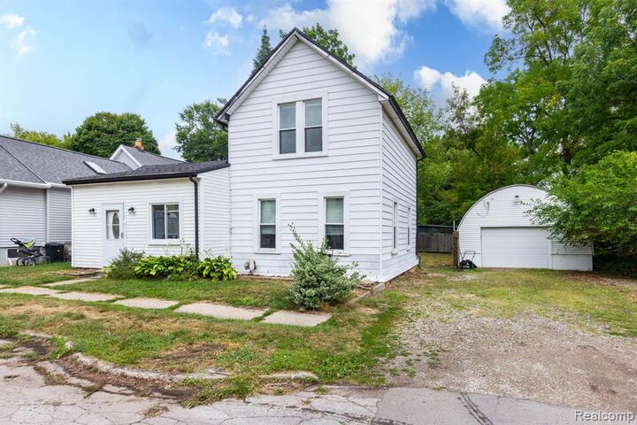 Property Photo:  172 Higgins Street  MI 48446 