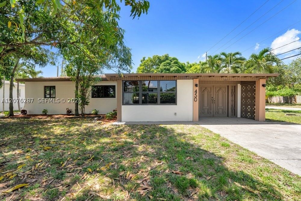 Property Photo: 450 NW 140th St FL 33168