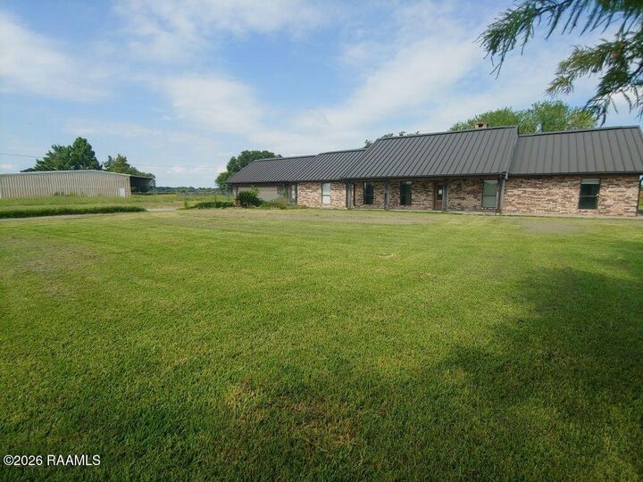 Property Photo:  545 Coulee Lanoire Road  LA 70512 