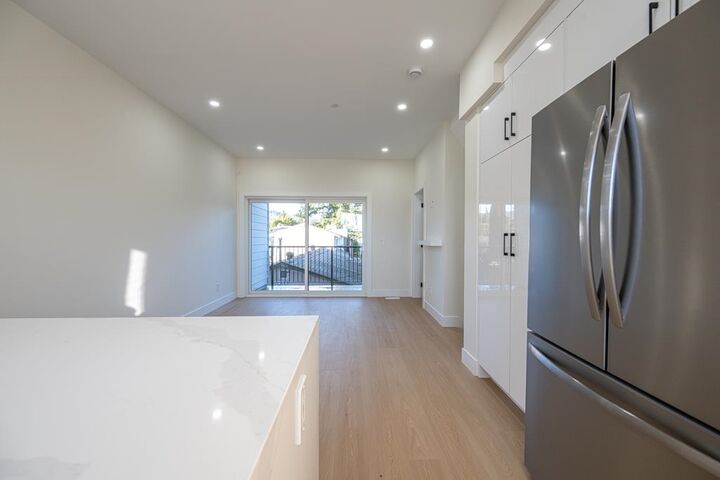Property Photo: 7533 Wren Street C BC V2V 3C1