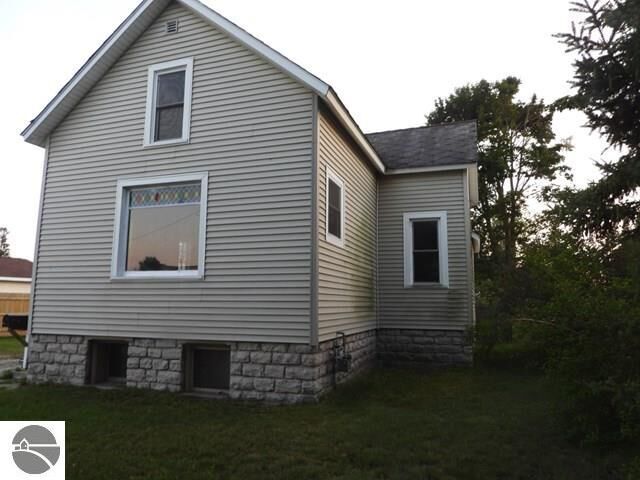Property Photo:  612 Saginaw Street  MI 49707 