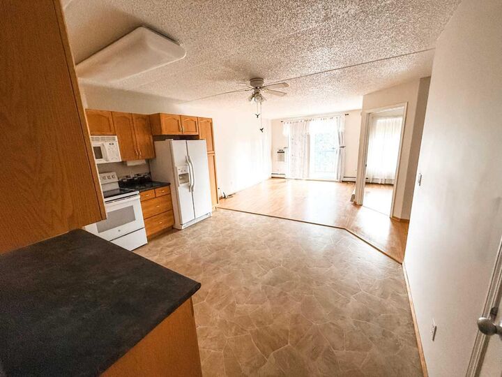 Property Photo: 777 48 Street 205 AB T7E 1Z6