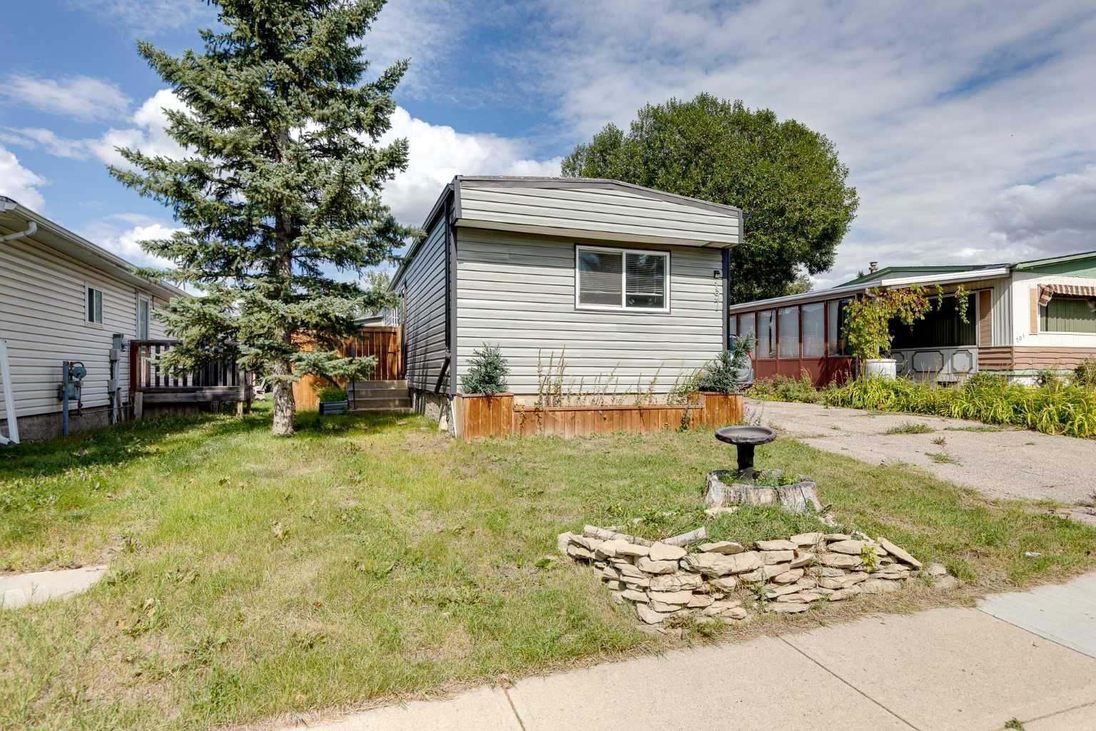 Property Photo: 197 Spring Dale Circle SE AB T4A 1N9
