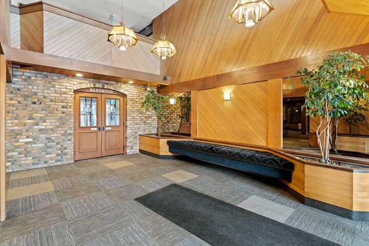 Property Photo: 3719C 49 Street NW 201 AB T3A 2E3