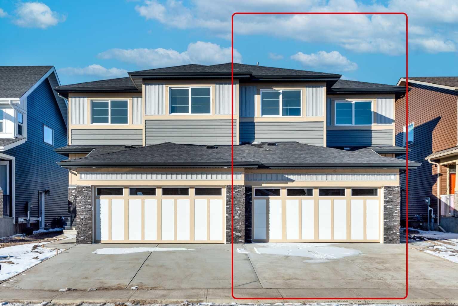 Property Photo: 122 Sandpiper Bend AB T1X 2S8