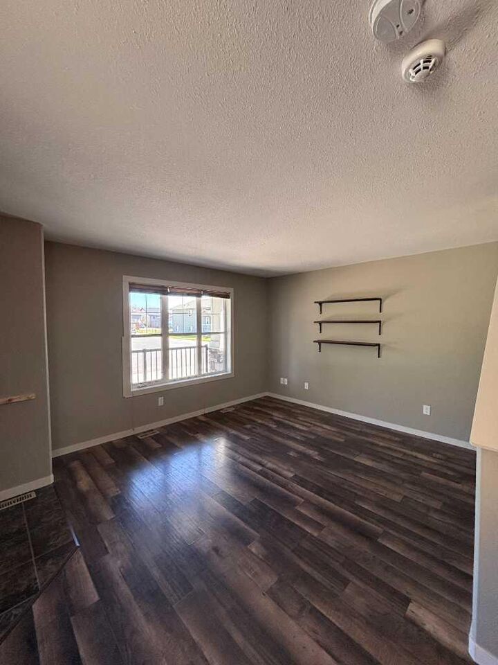 Property Photo:  120 Mt Sundial Court W  AB T1J 5B7 