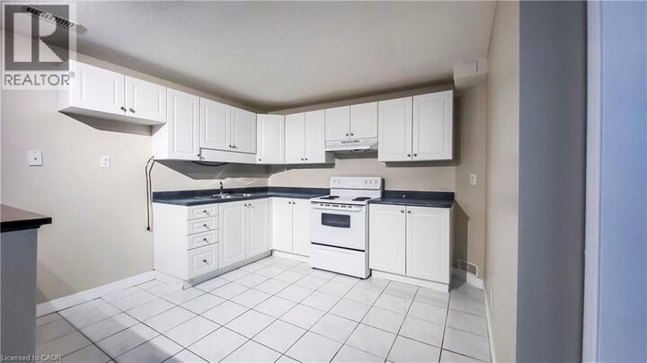 Property Photo:  132 Udvari Crescent 1  ON N2N 3P6 