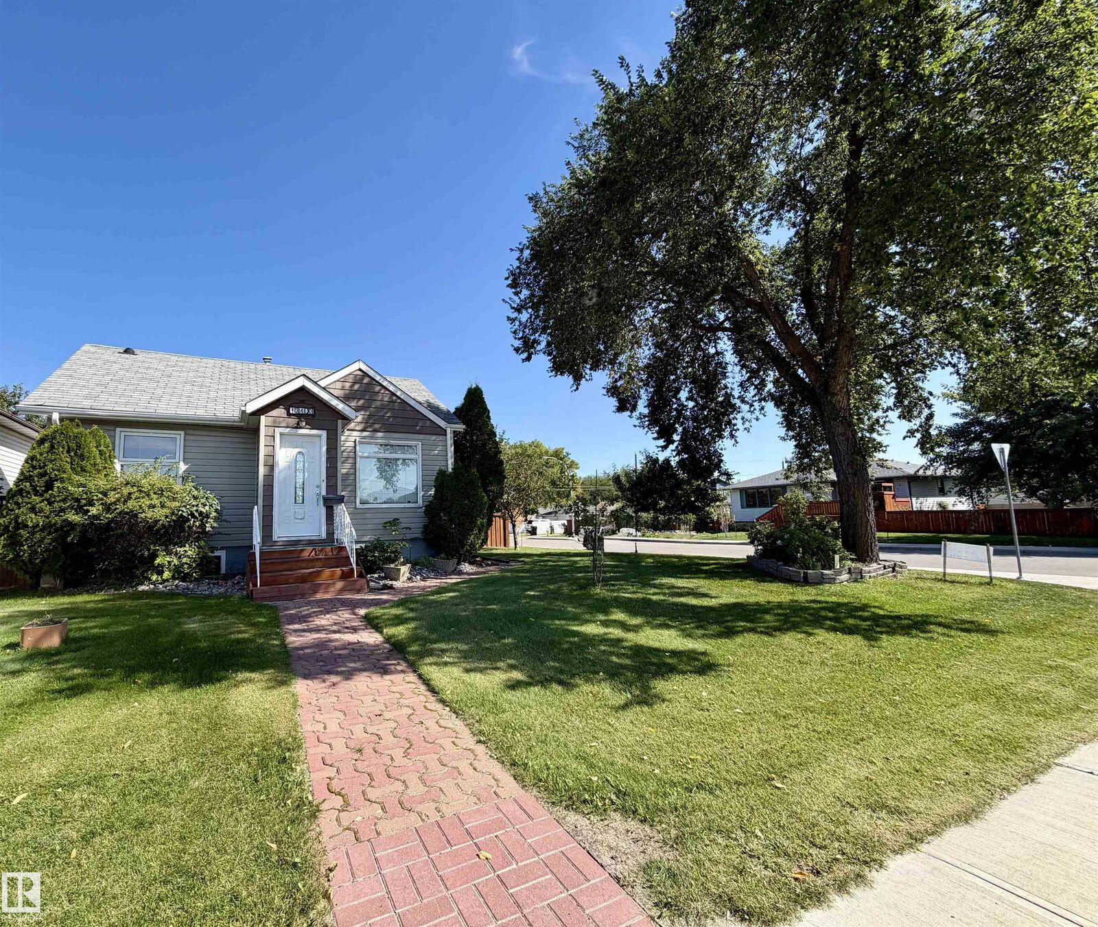 Property Photo:  13103 121 Street NW  AB T5L 0B7 