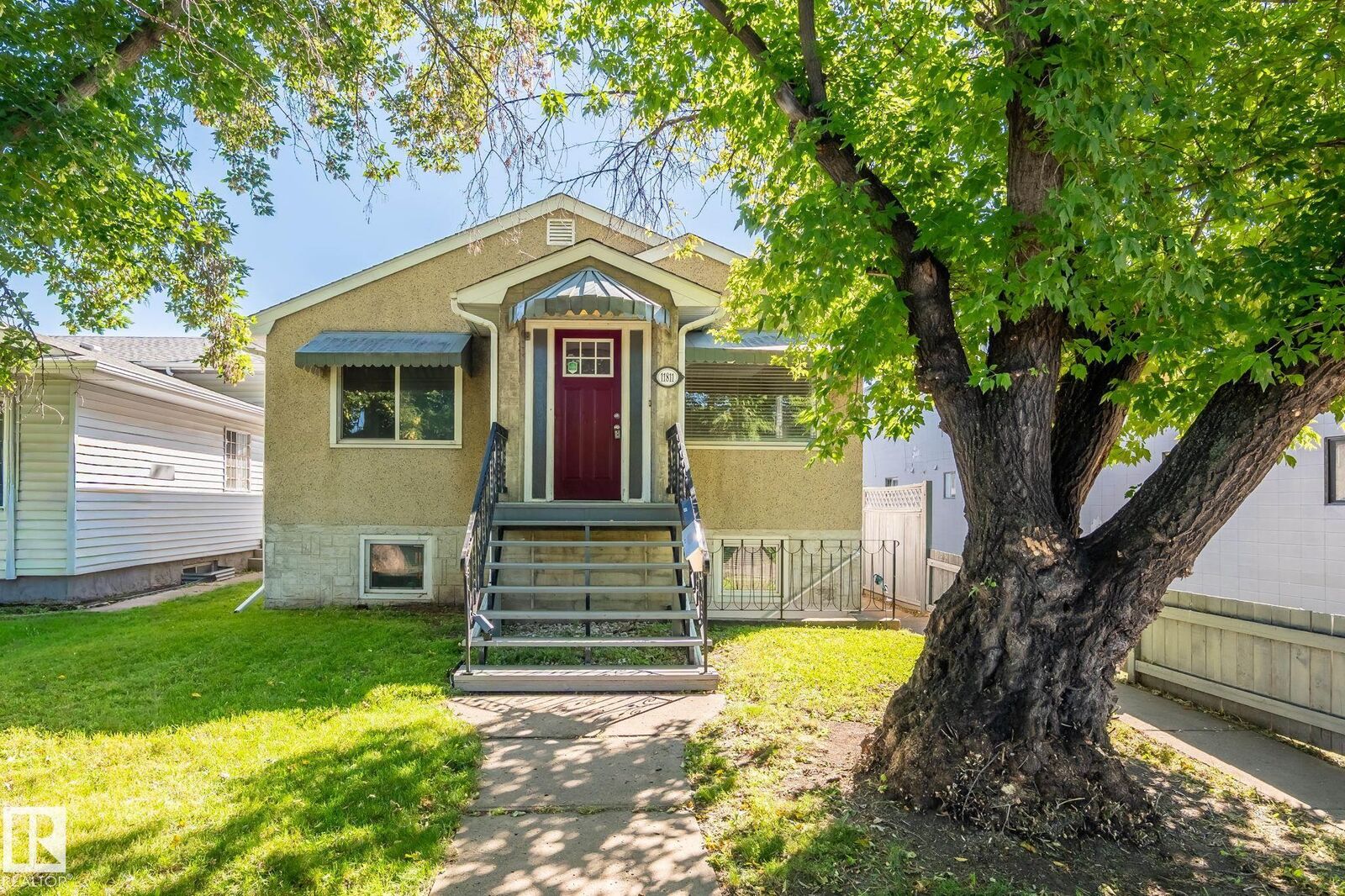 Property Photo:  11811 70 Street NW  AB T5B 1T8 
