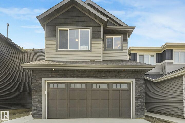 Property Photo: 511 157 Avenue NE AB T5Y 4N2