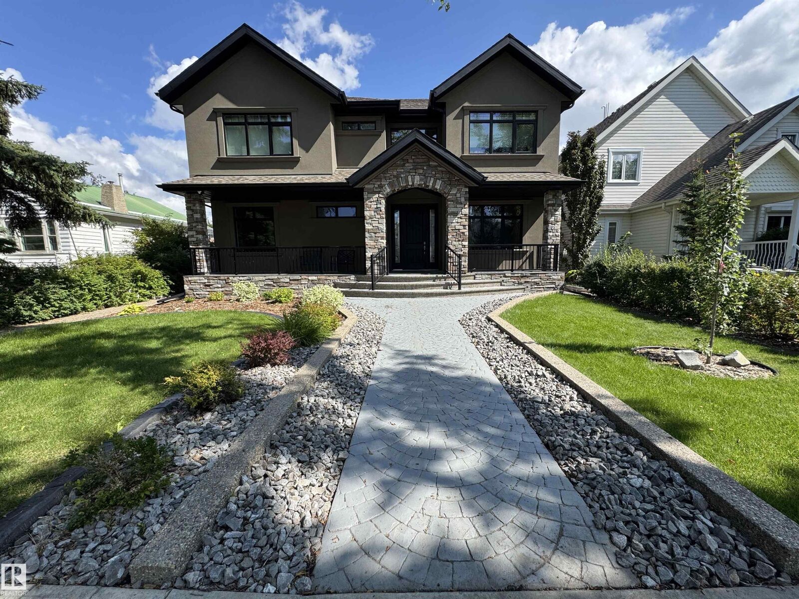 Property Photo: 10821 128 Street NW AB T5M 0W3