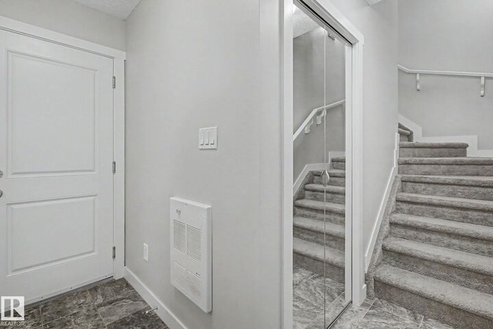 Property Photo: 1530 Tamarack Boulevard NW 71 AB T6T 2E6