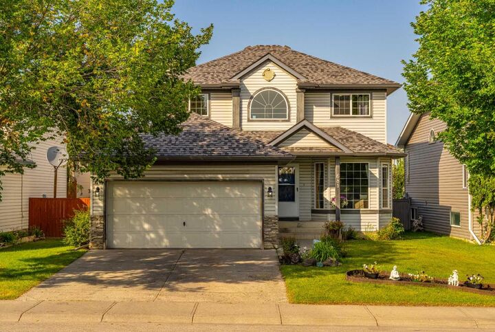 Property Photo: 681 Harvest Hills Drive NE AB T3K 4R3