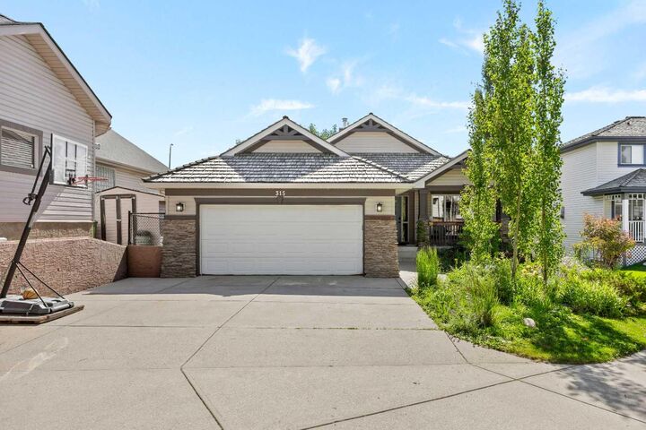 Property Photo:  315 Rocky Ridge Bay NW  AB T3G 4H8 