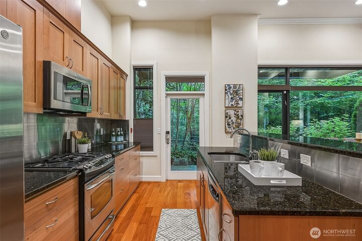 Property Photo:  15408  Main Street 102  WA 98012 