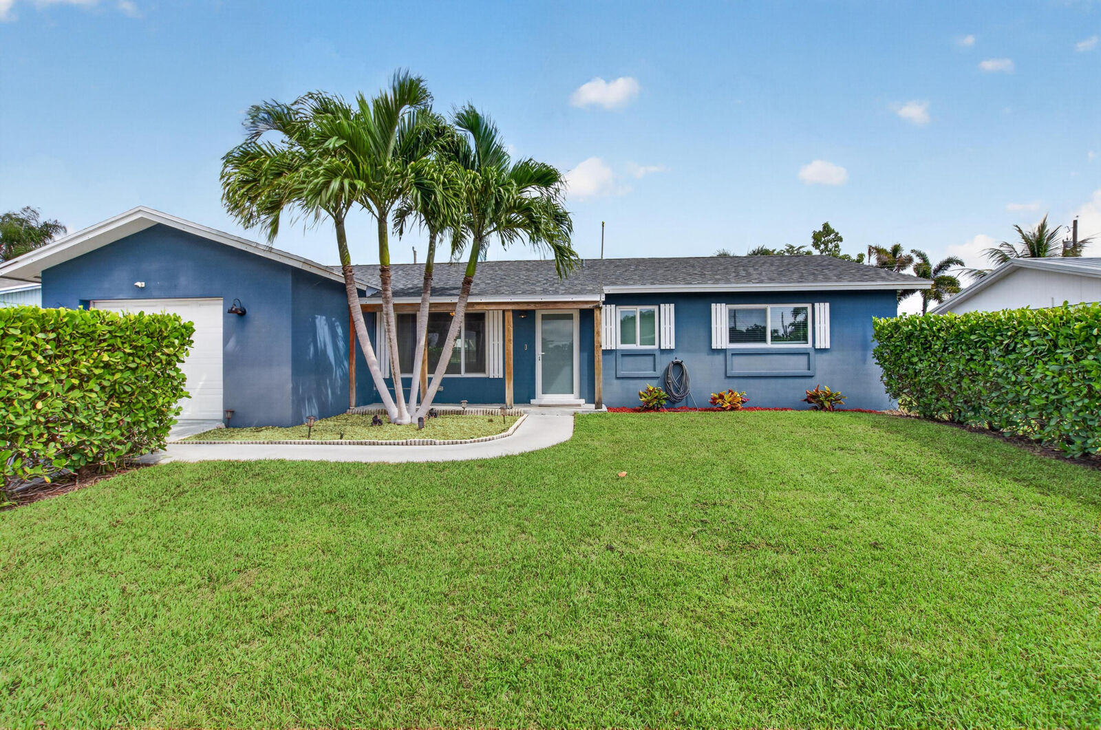 Property Photo:  1023 SW 25th Place  FL 33426 