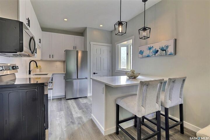 Property Photo:  2305 McDonald Street  SK S4N 2Z2 