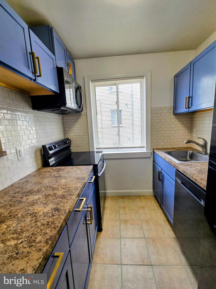 Property Photo: 705 Brandywine Street SE 201 DC 20032