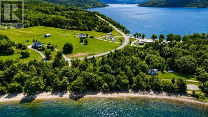 Property Photo:  395 Highway, Whycocomagh Rd  NS B0E 3M0 
