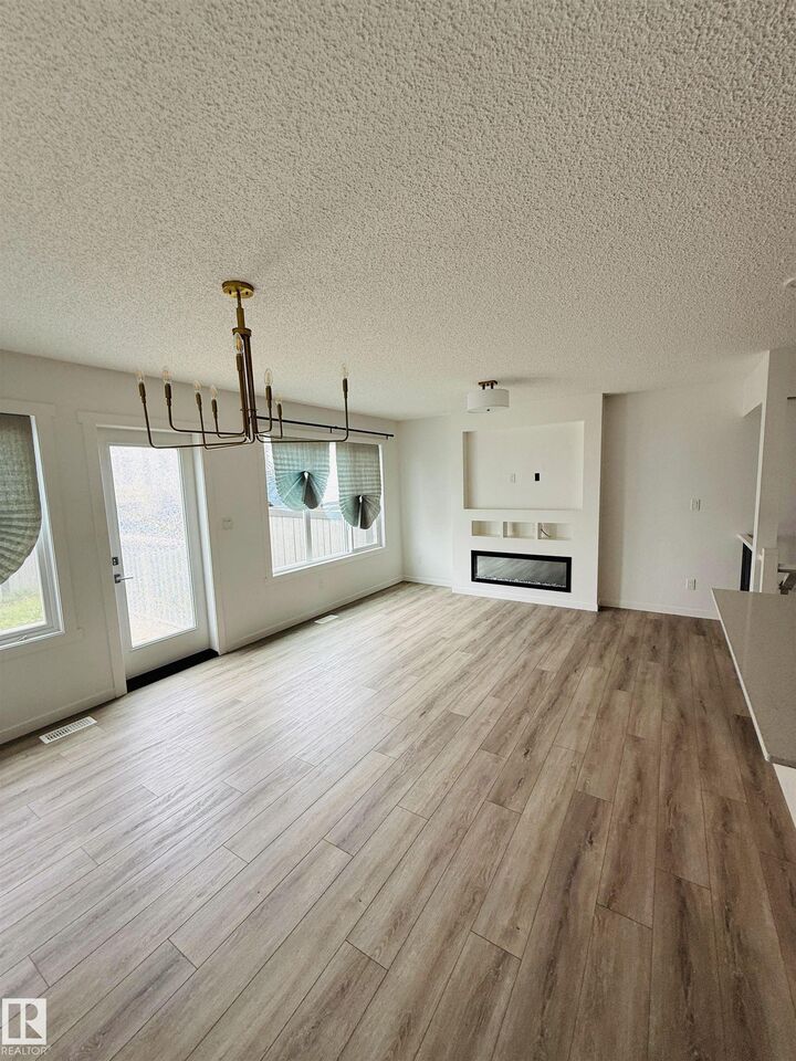Property Photo:  905 172 Street SW 4  AB T6W 5L8 