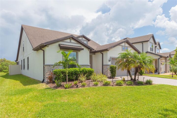 Property Photo: 7430 Pool Compass Loop FL 33545