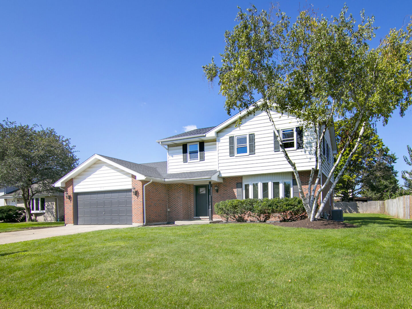 Property Photo: 1413 Delmar Drive IL 60451