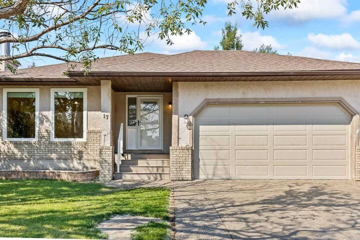 Property Photo:  17 Sheep River Crescent  AB T1S 1N6 