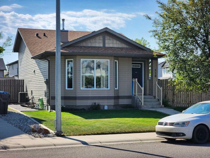 Property Photo:  118 Silkstone Road W  AB T1J 2G3 