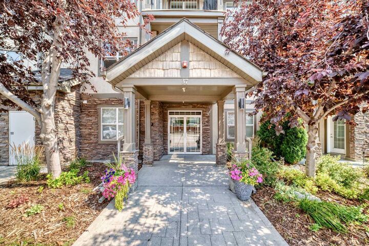 Property Photo:  37 Prestwick Drive SE 204  AB T2Z 4Z2 