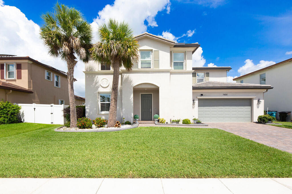 Property Photo: 7691 NW Greenspring Street FL 34987