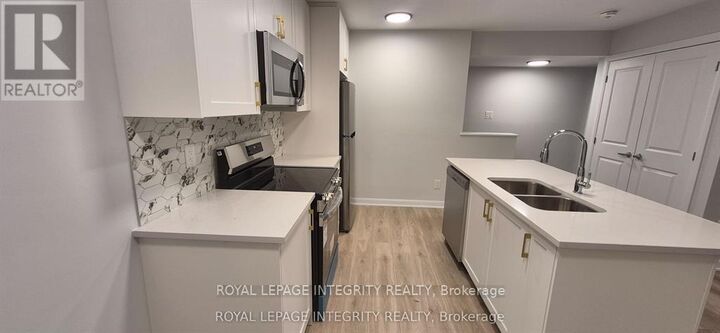 Property Photo:  401 Glenroy Gilbert Drive 8  ON K2J 7N7 