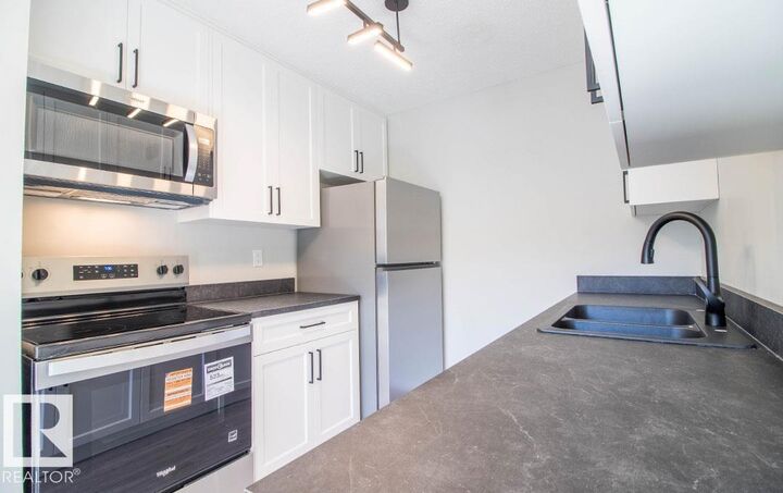 Property Photo: 3129 139 Avenue NW AB T5Y 1R4