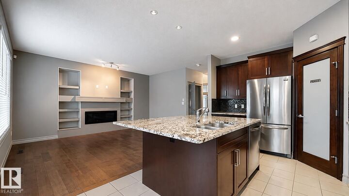 Property Photo: 885 Windermere Wynd NW AB T6W 2M6