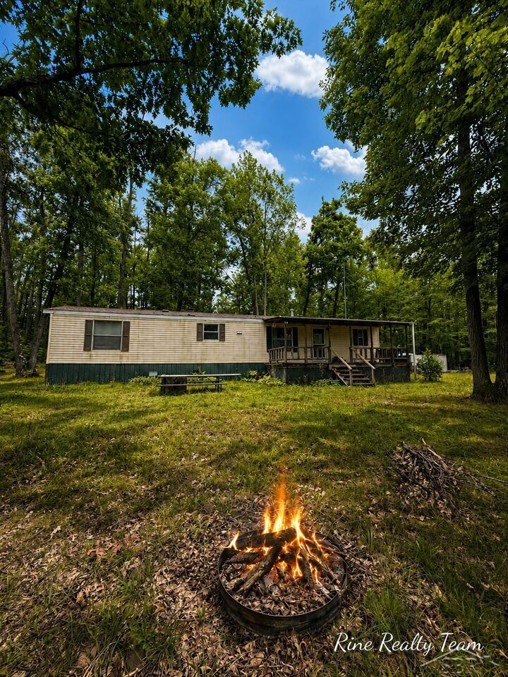 Property Photo:  1385 Allard Acres Trail  MI 49751 