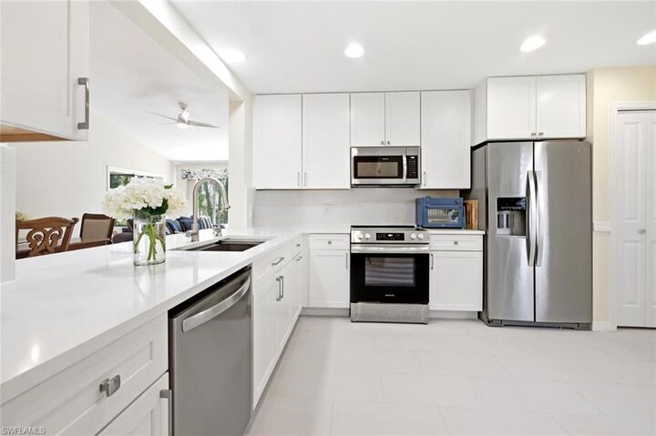 Property Photo:  506 Courtside Dr E201  FL 34105 