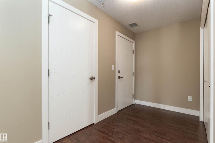 Property Photo:  111 Festival Way 215  AB T8A 4Y4 
