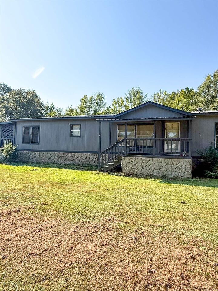 Property Photo:  203 Ouachita 406 Road  AR 71701 