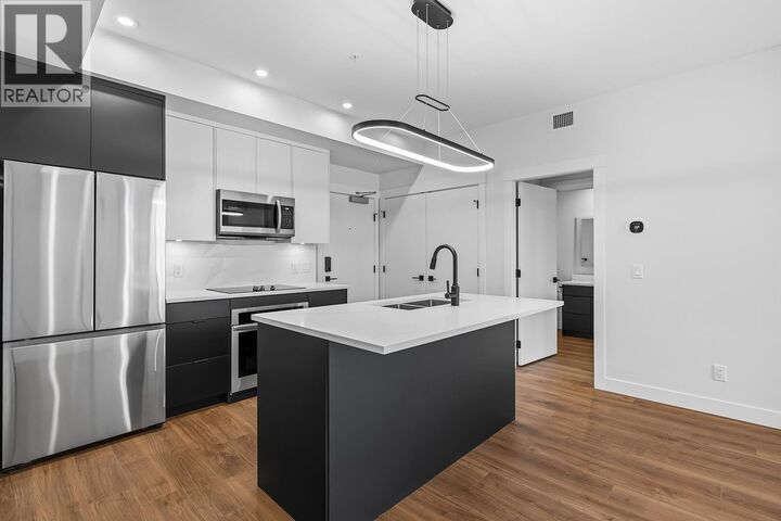 Property Photo:  1281 Pridham Avenue 404  BC V1Y 6B3 