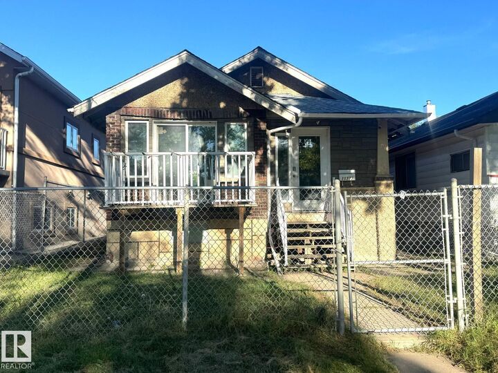 Property Photo:  11323 97 Street NW  AB T5G 1X3 