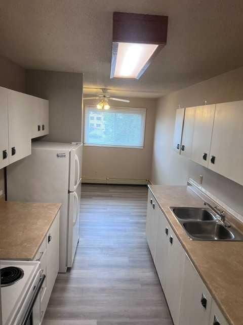 Property Photo:  4814 46 Street 304  AB T4N 1N1 